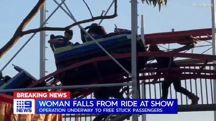 戴耳機穿軌道被撞_女子翻入過山車軌道撿手機被撞飛_菲律賓過山車飛出軌道